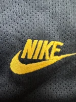 Nike Trainingshose Sporthose mit gelben Streifen Anthrazit M – Bild 2